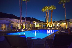 Nighttime  view of the pool at The Palm Springs Hotel on North Palm Canyon.